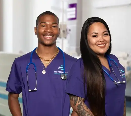 Medical Assistant Course students in Las Vegas wearing scrubs and stethoscopes at Northwest Career College